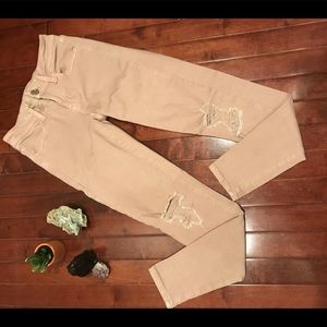 Light pink ripped American eagle skinny jeans